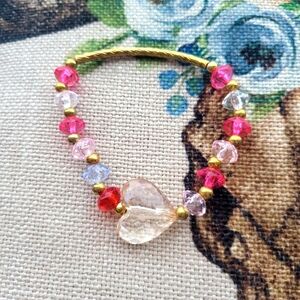 NWOT Hand Crafted Heart Bracelet with Red, Blue, Pink and Gold Bids.